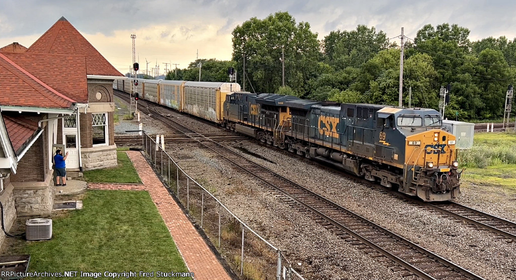 CSX 69 pulls across the C&O and past the depot with the first cut of cars.